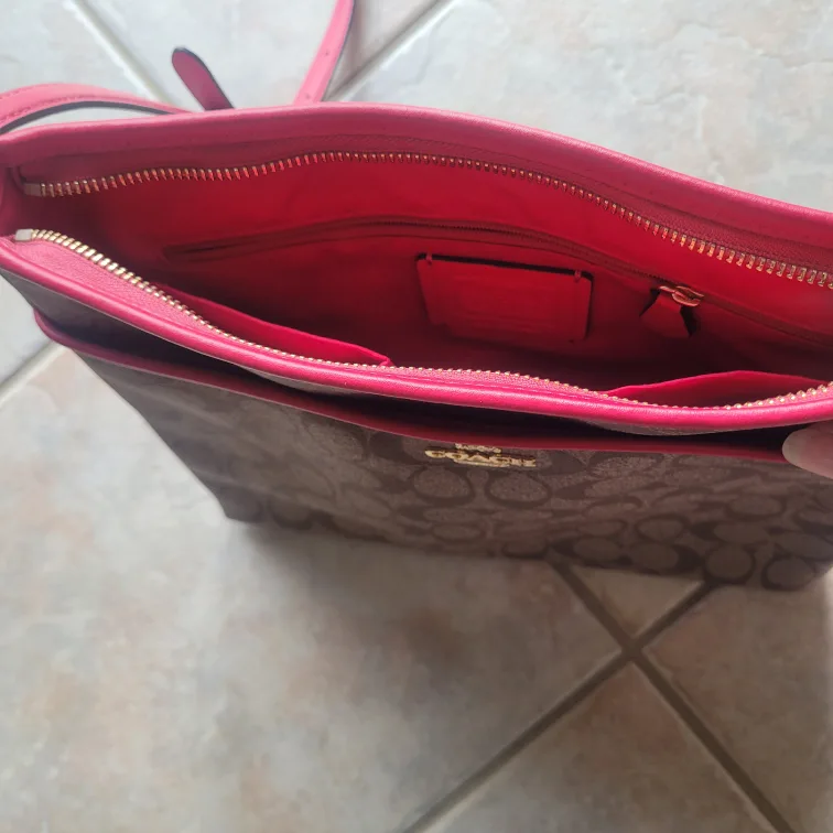 Coach crossbody bag, brown signature canvas with pink accents image indicator(3)