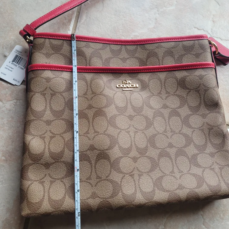 Coach crossbody bag, brown signature canvas with pink accents image indicator(6)