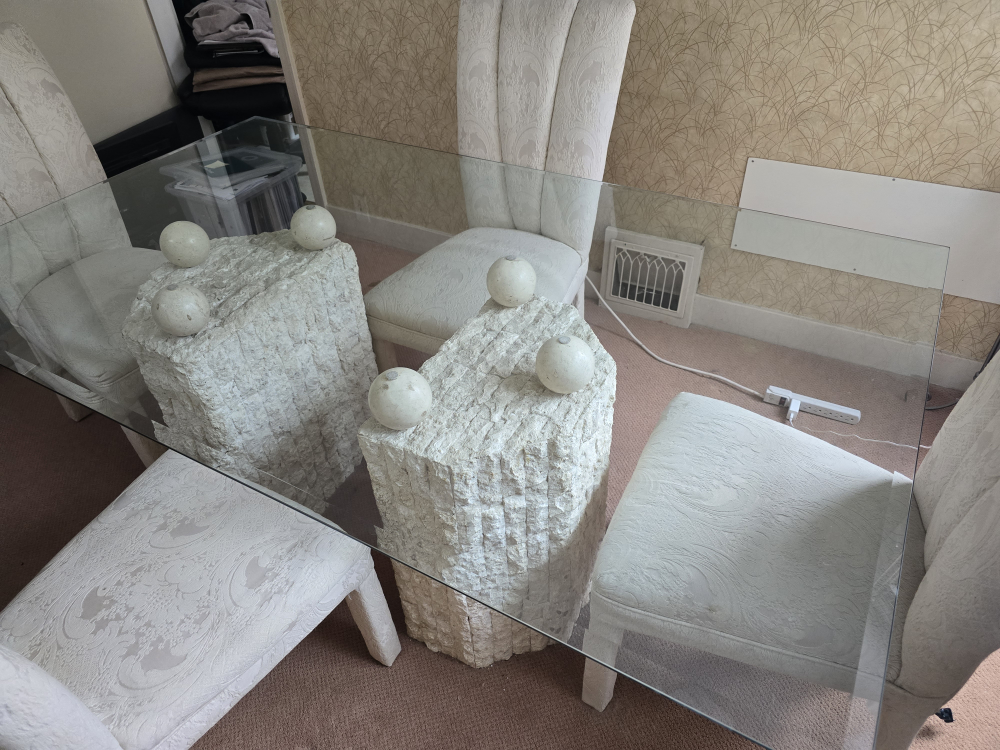 Glass-top dining table with unique stone base and four chairs - photo 5