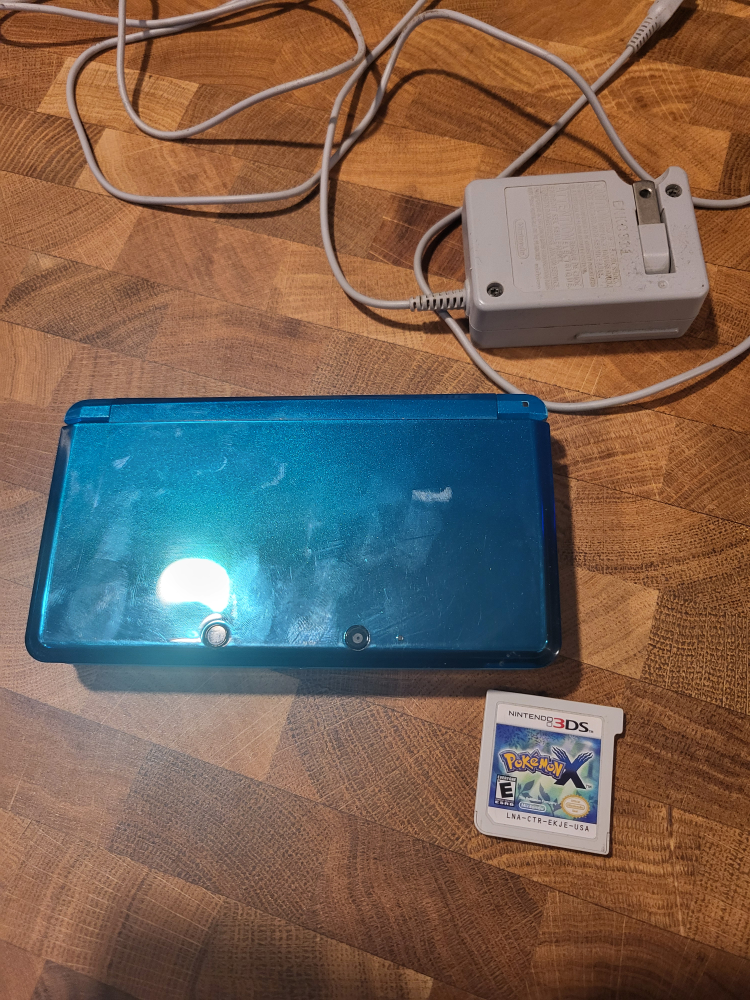 Nintendo 3DS Console with Pokémon X Game