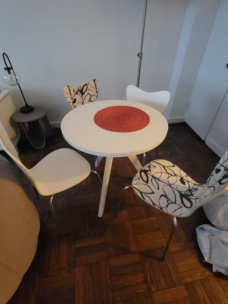 White Round Dining Table with Four Chairs