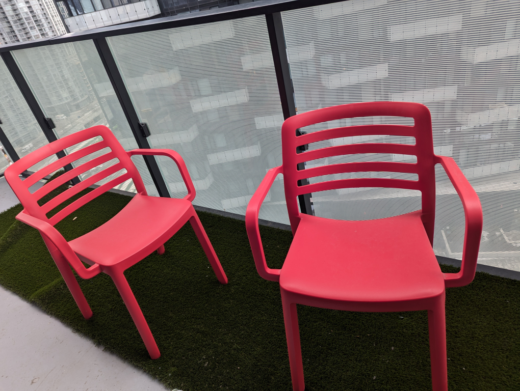 Pair of Red Plastic Patio/Balcony Armchairs