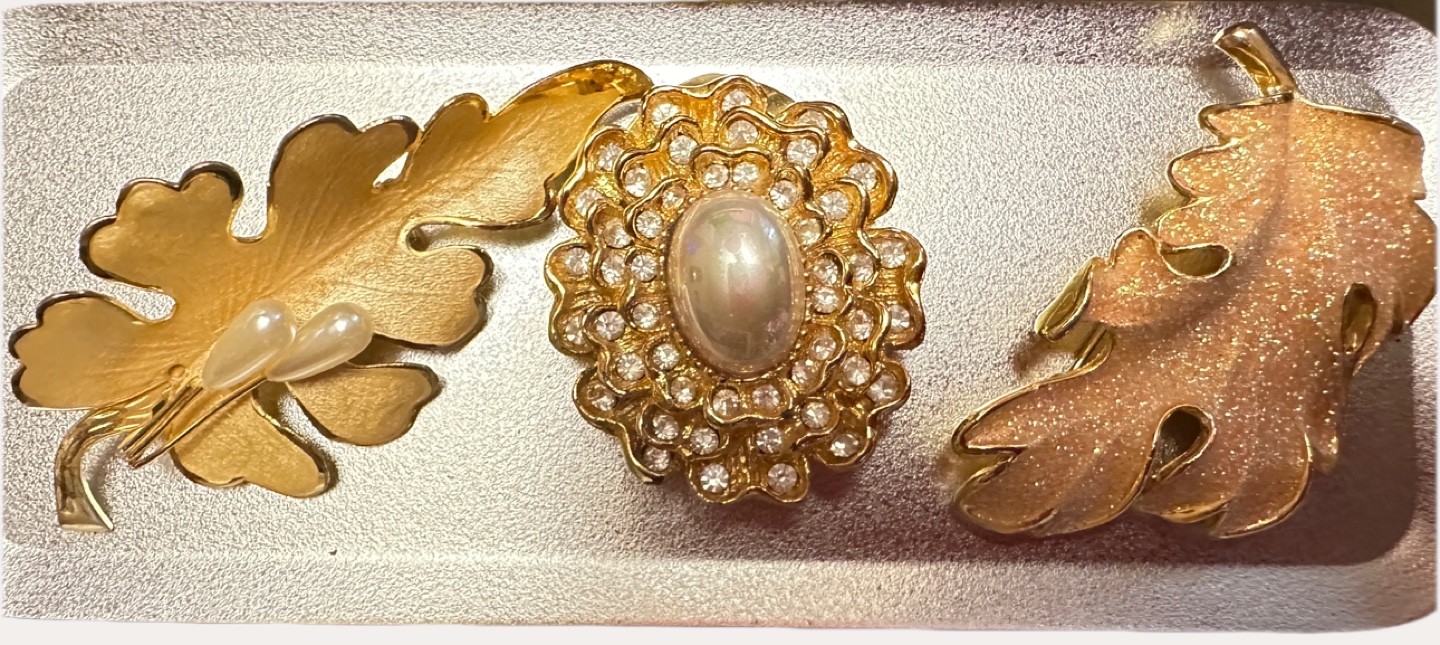 Three Gold-Tone Brooches: Leaf, Flower, and Glittery Leaf