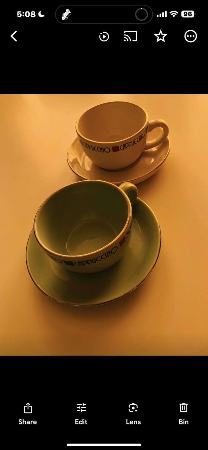 Two Cappuccino Cups and Saucers