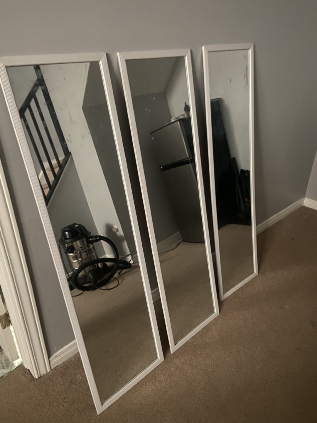 Three White Framed Mirrors