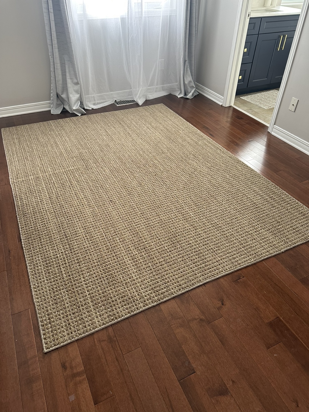 Neutral-toned area rug jute style