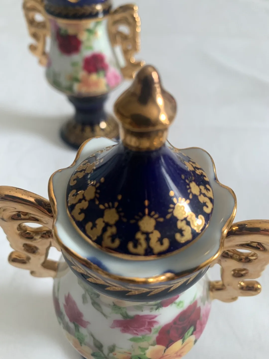 Pair of Vintage Porcelain Mini Vases with Rose Design image indicator(3)