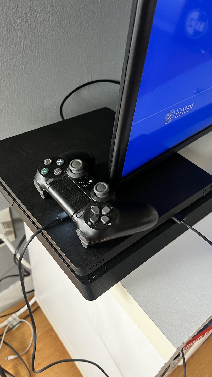 PlayStation 4 Slim 1TB Console with Controller and Headset