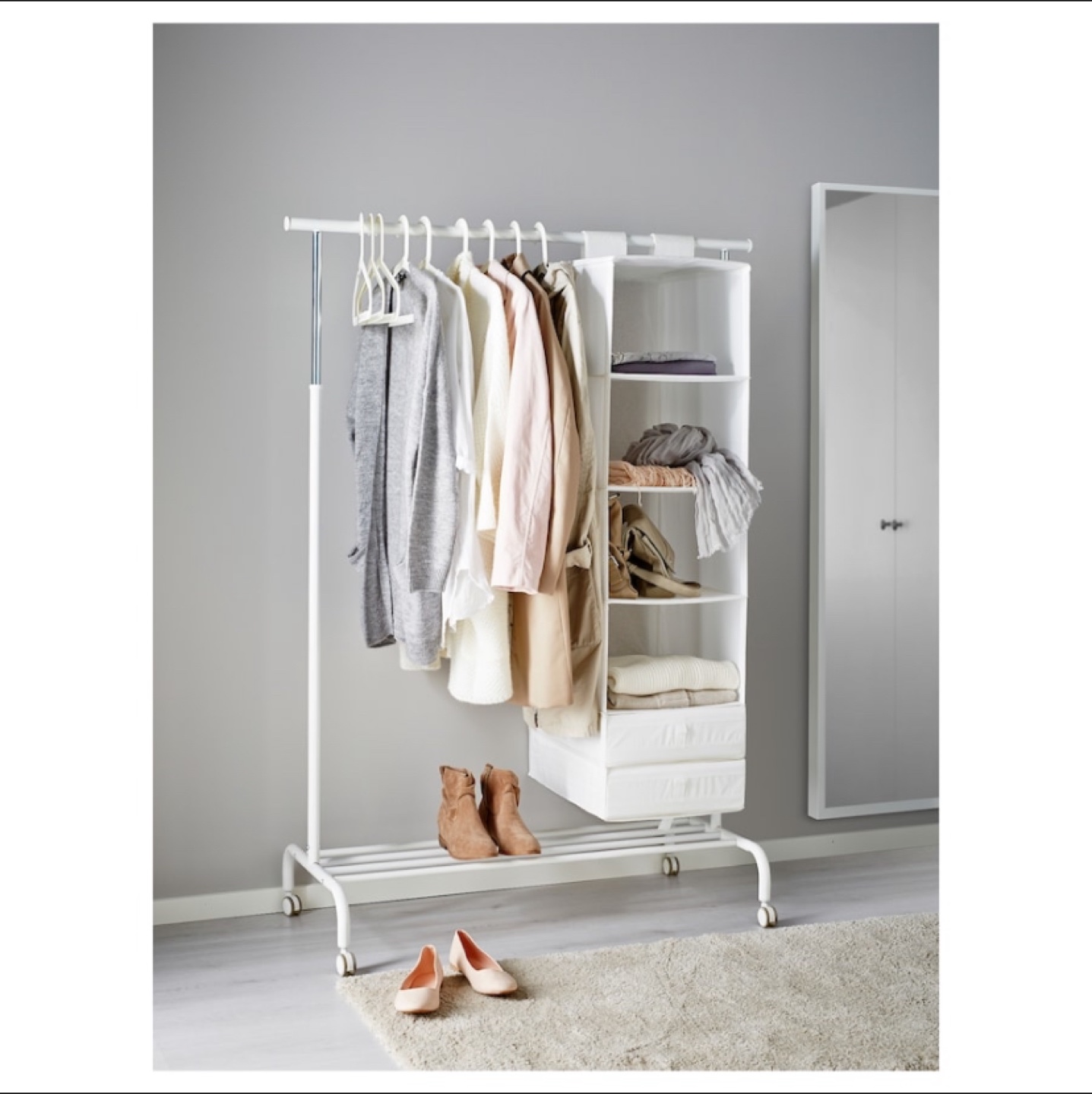 IKEA White Clothes Rack with Wheels. RIGGA - photo 2