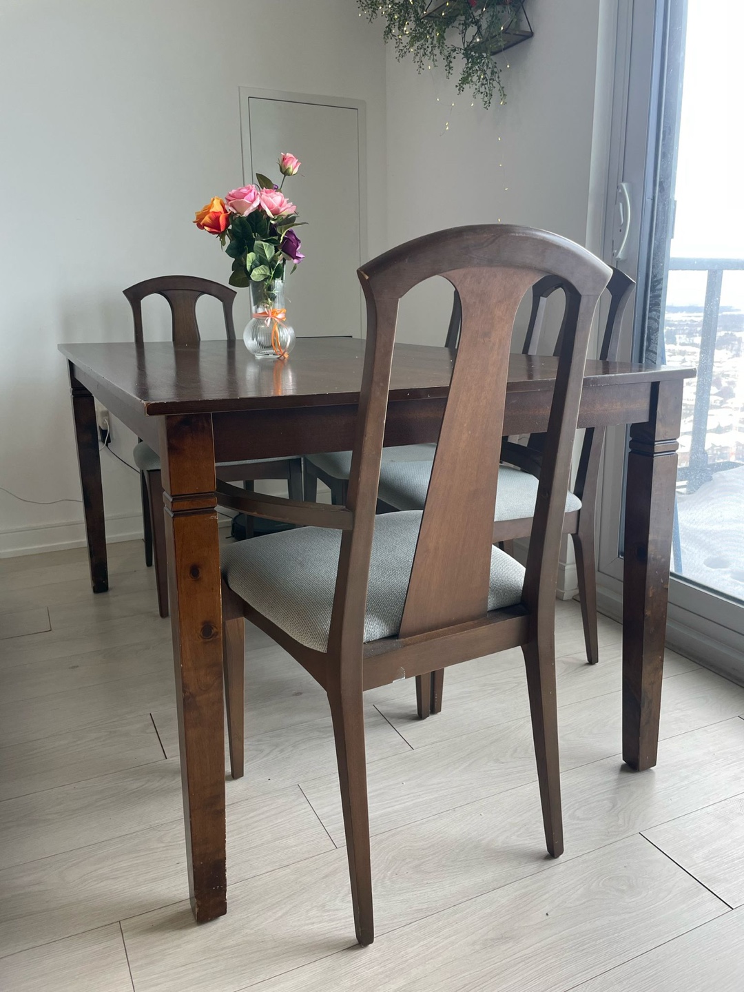 Dark brown wooden dining table and four chairs - photo 2