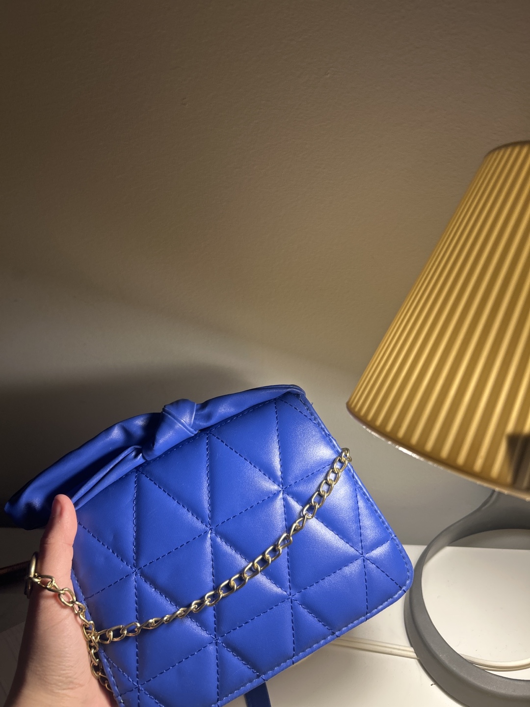 Blue quilted crossbody bag