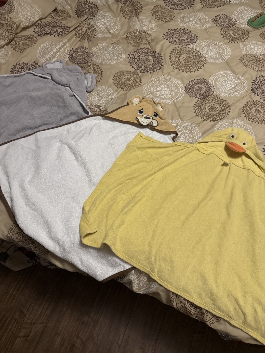 Three hooded baby towels