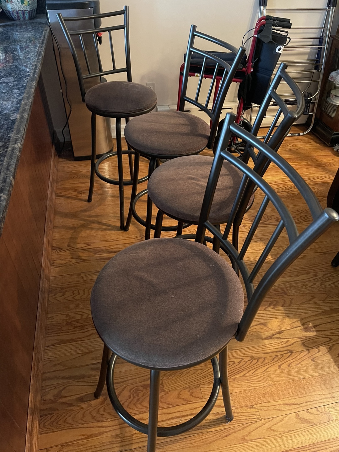 Set of Four Brown Swivel Bar Stools