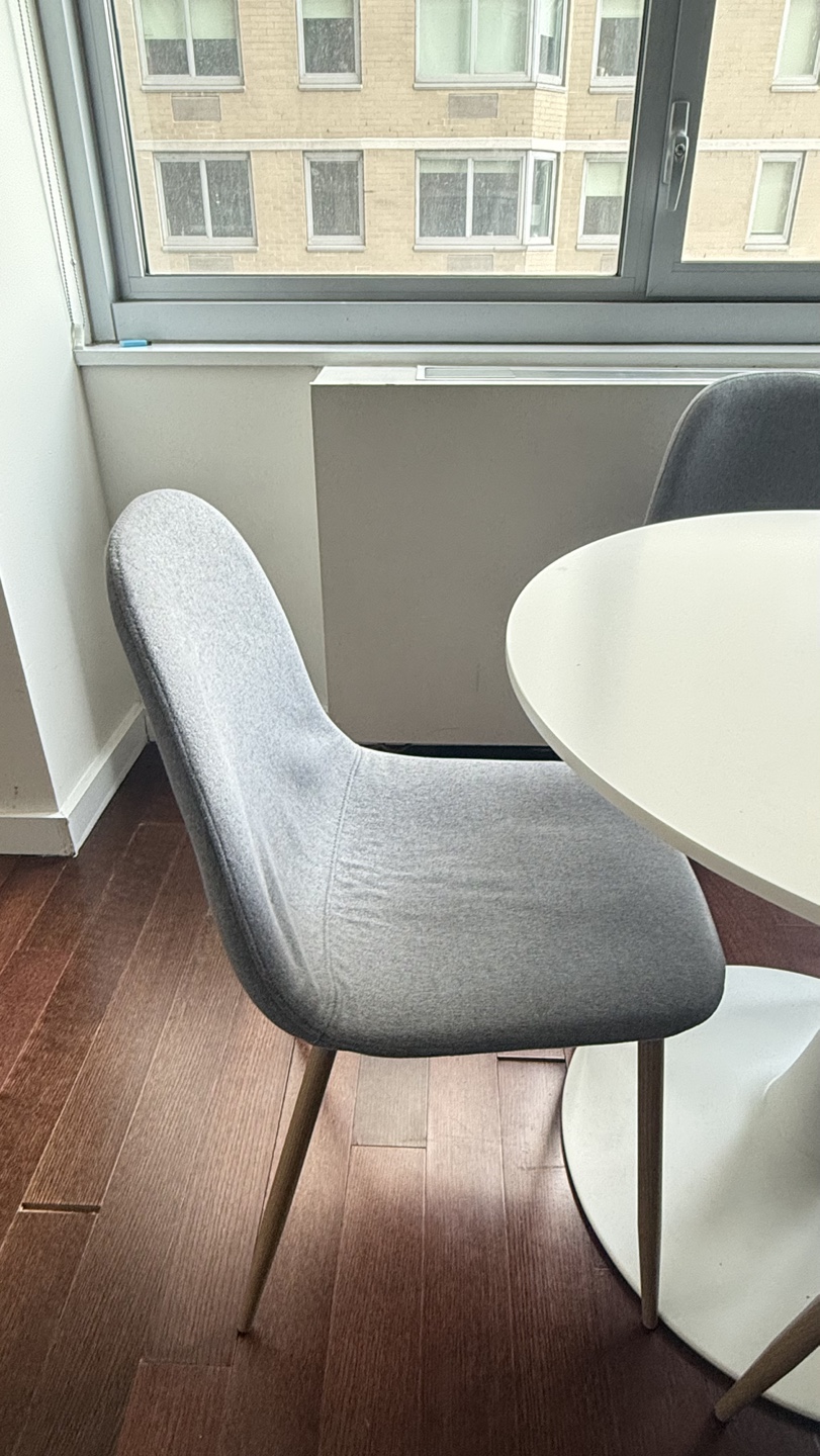 Round White Dining Table with Four Grey Fabric Chairs - photo 2