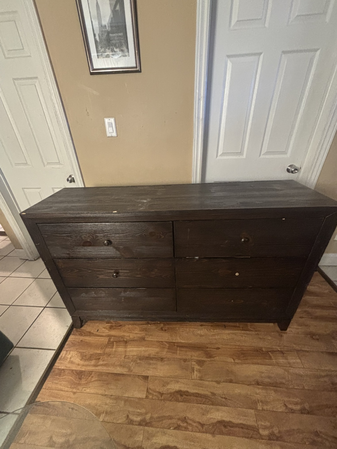 Dark brown six-drawer dresser