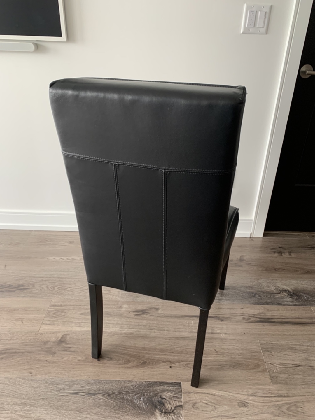Two Black Leather Classic Dining Chairs