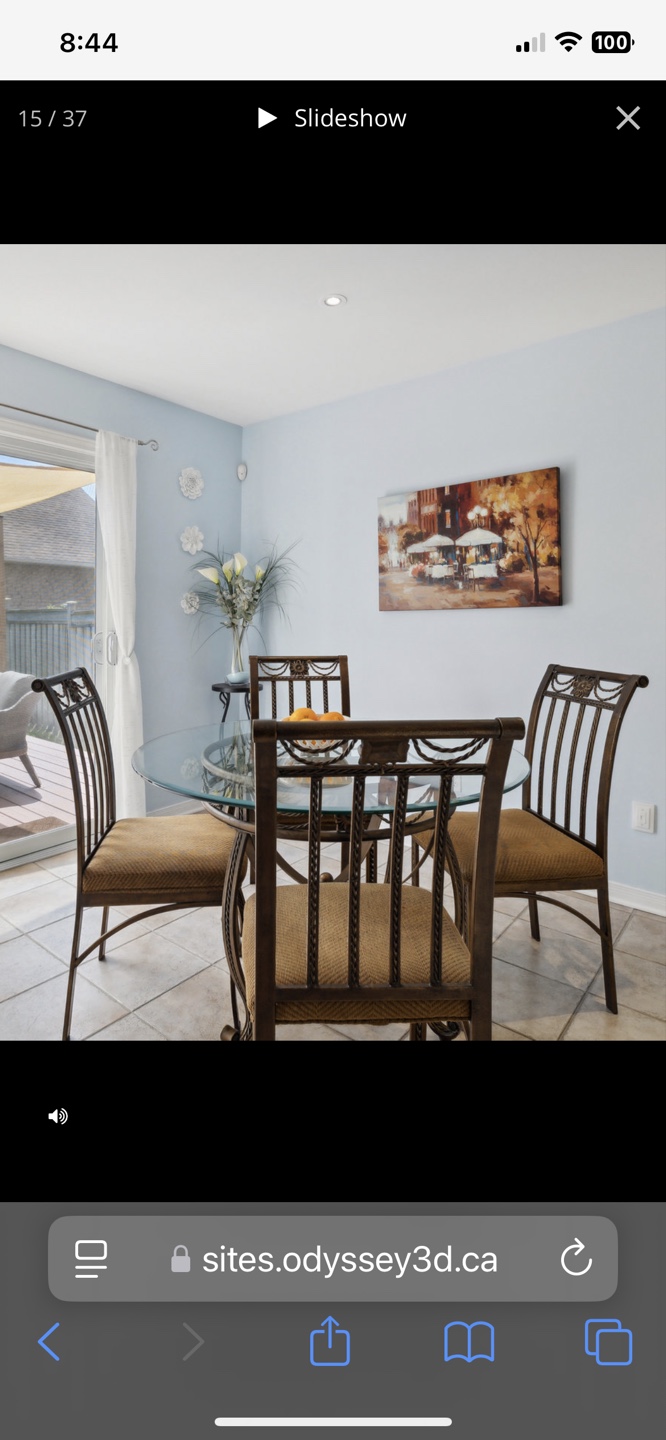 Glass-top dining table and four chairs