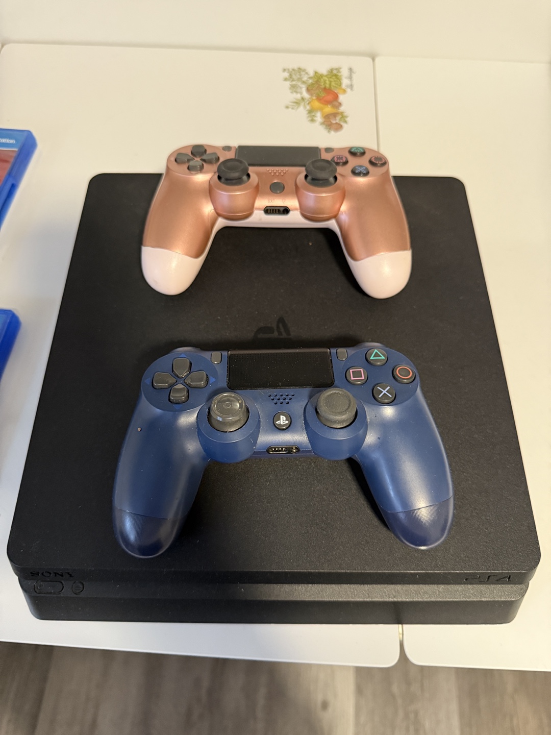 PS4 Slim Console, 2 Controllers, 5 Games & Cables