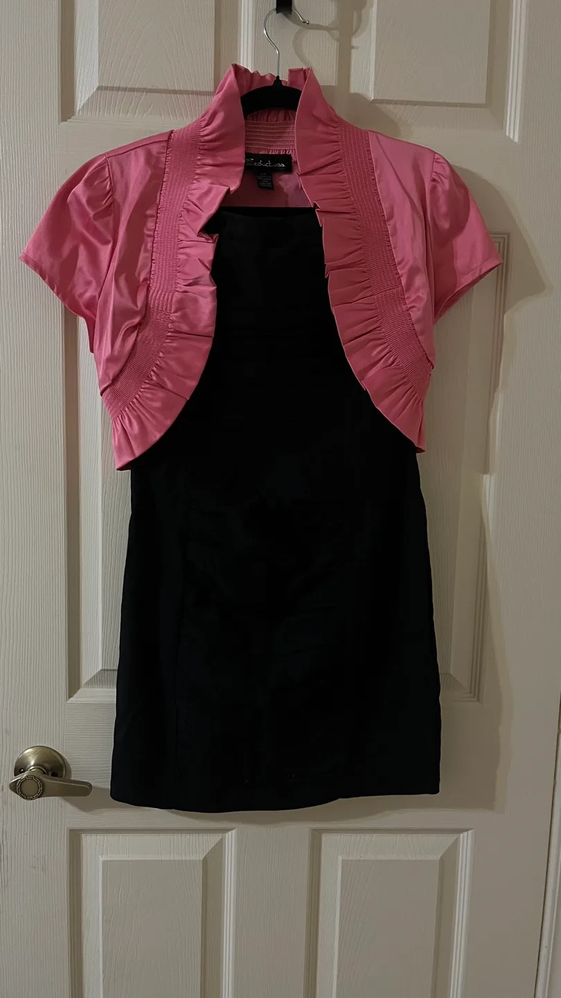 Pink bolero and black dress thumbnail