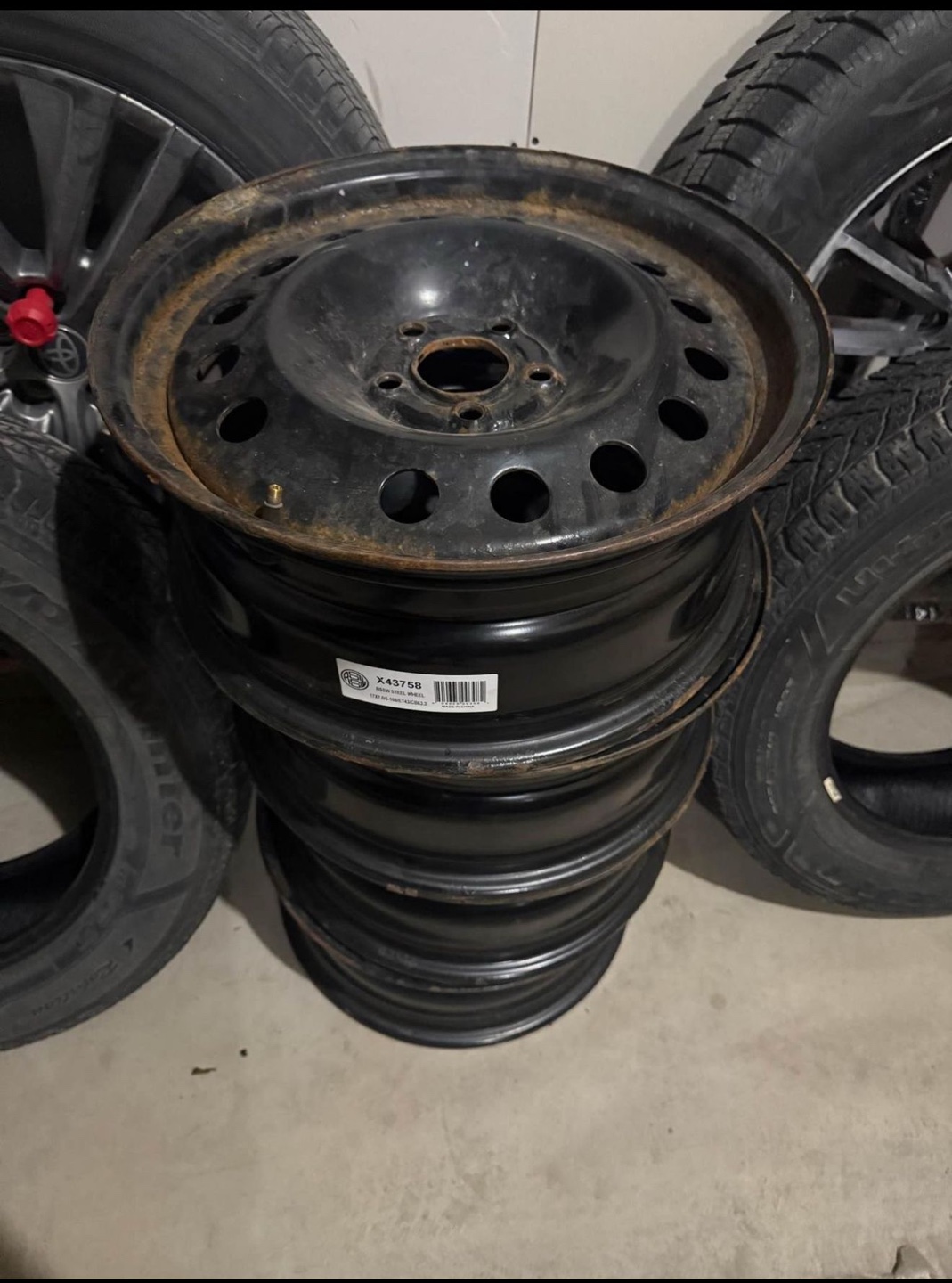 Four 17 inch steel rims