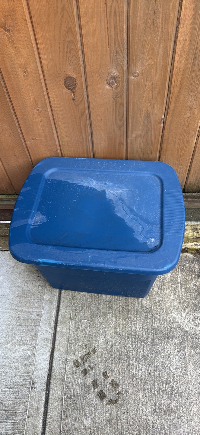 Two bags of potting soil and a storage container - photo 3