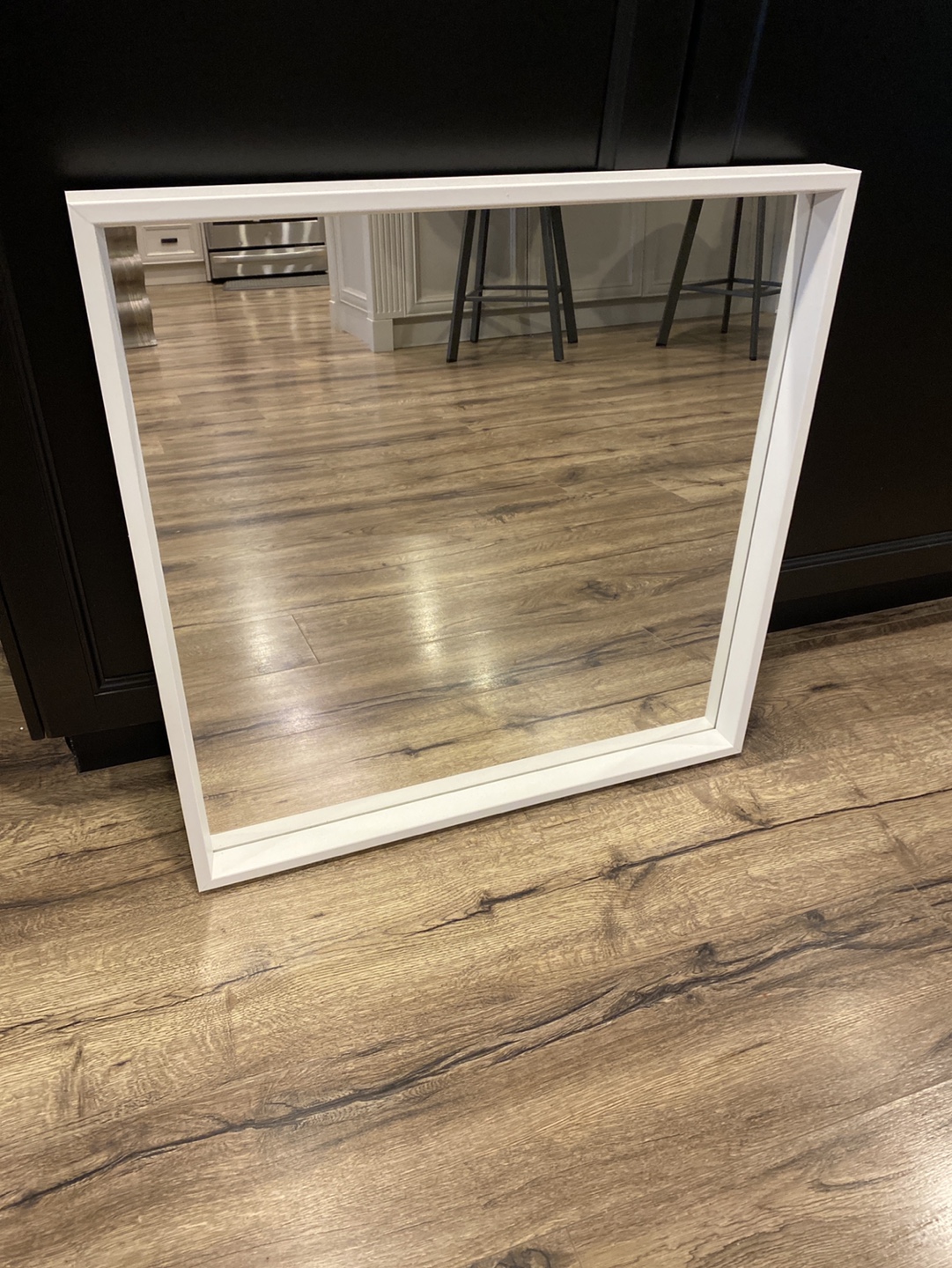 White framed square mirror
