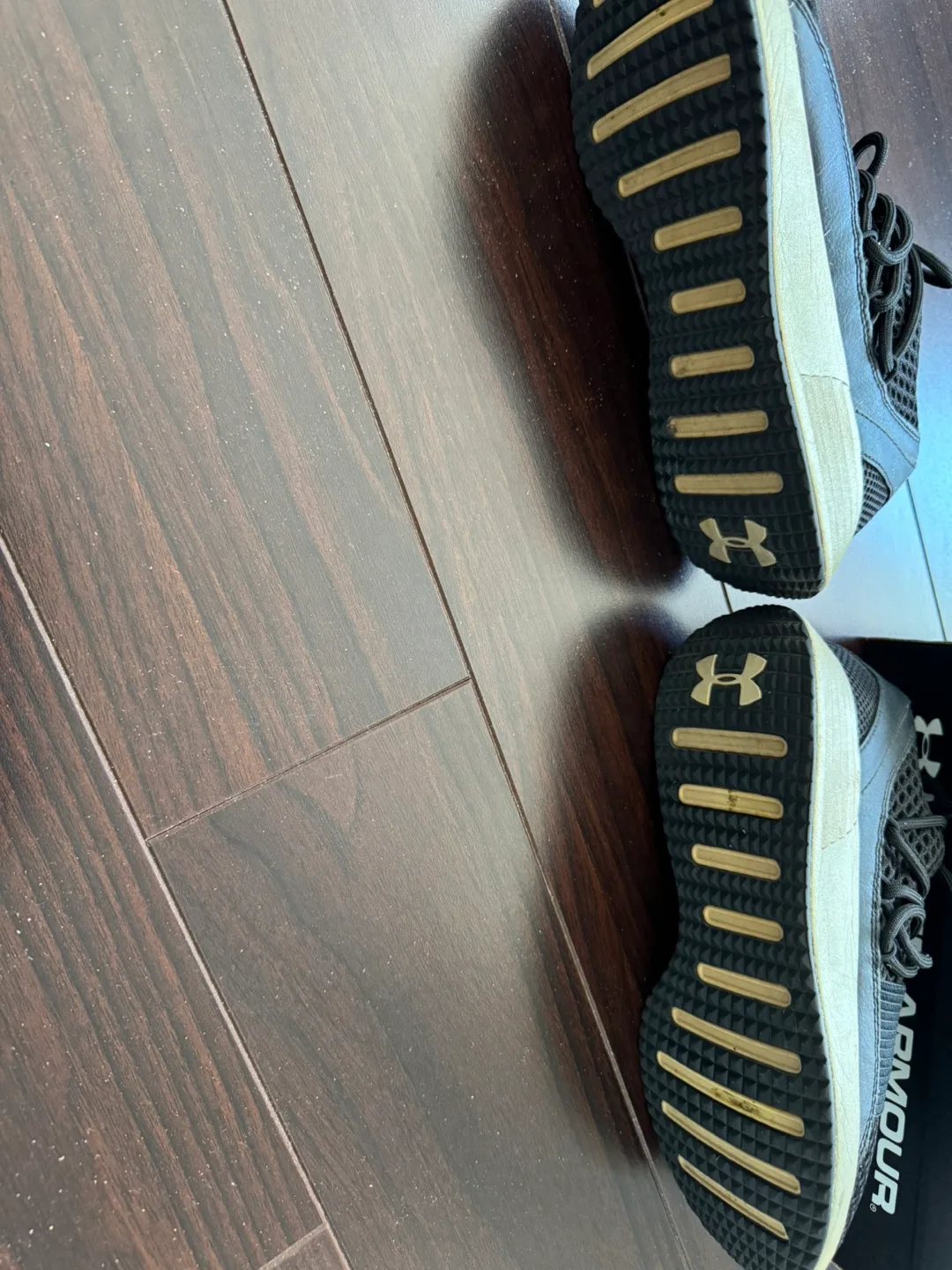 Under Armour Women's Black & Gold Slip-On Sneakers image indicator(6)