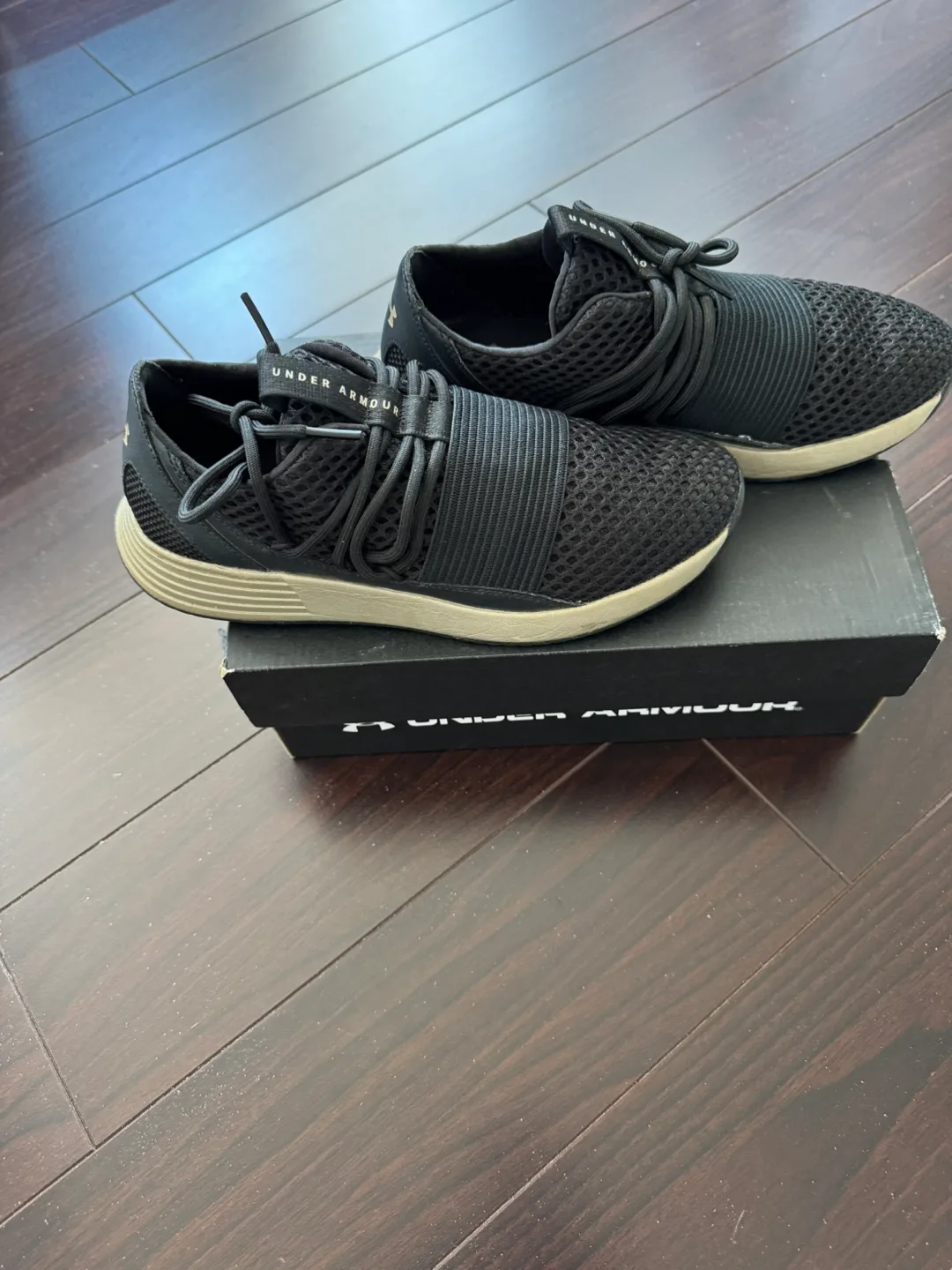 Under Armour Women's Black & Gold Slip-On Sneakers image indicator(4)