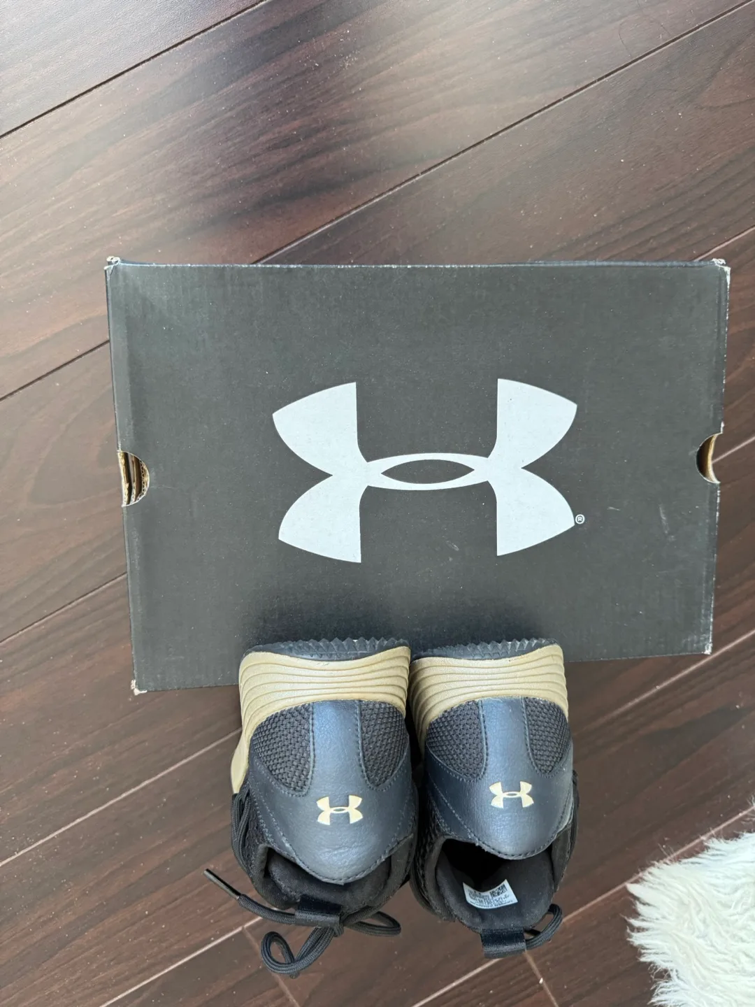 Under Armour Women's Black & Gold Slip-On Sneakers image indicator(7)