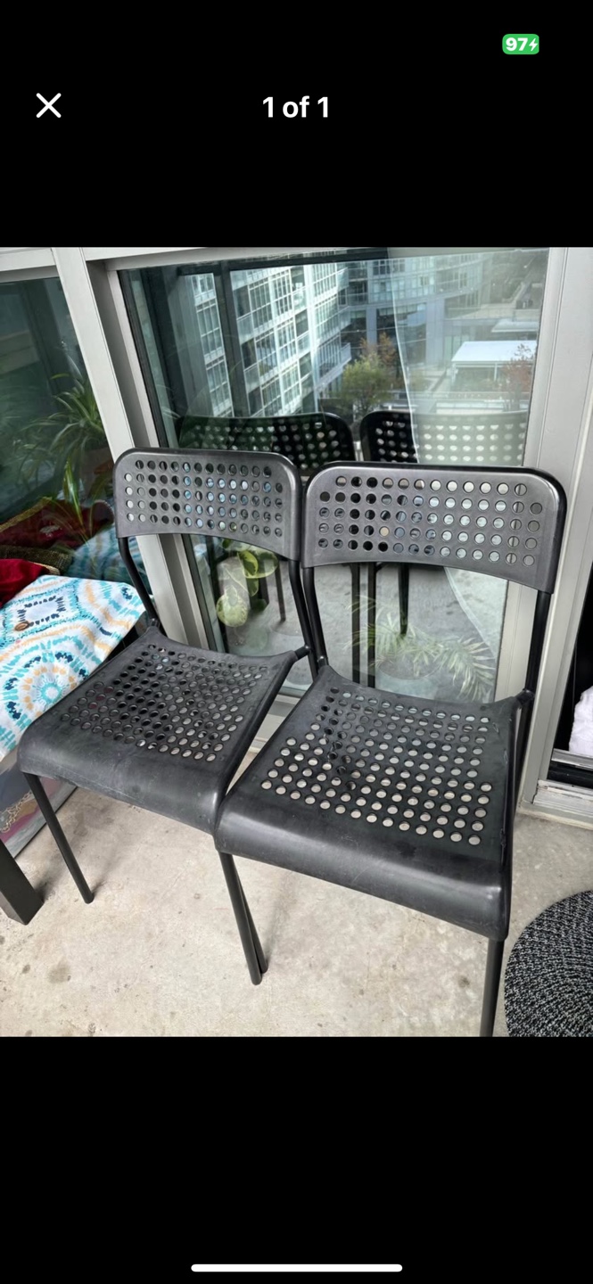 Pair of Black Plastic Chairs