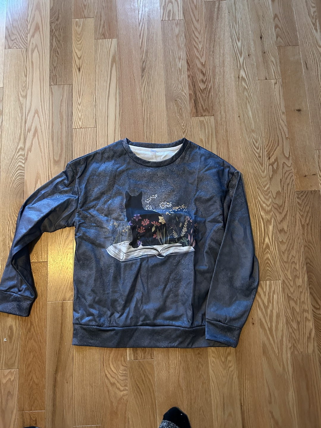Grey cat and book sweatshirt
