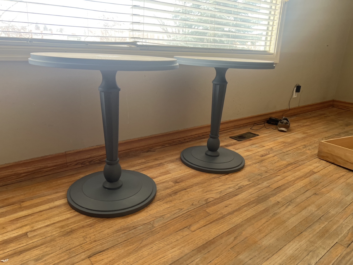 Set of two charming round accent tables