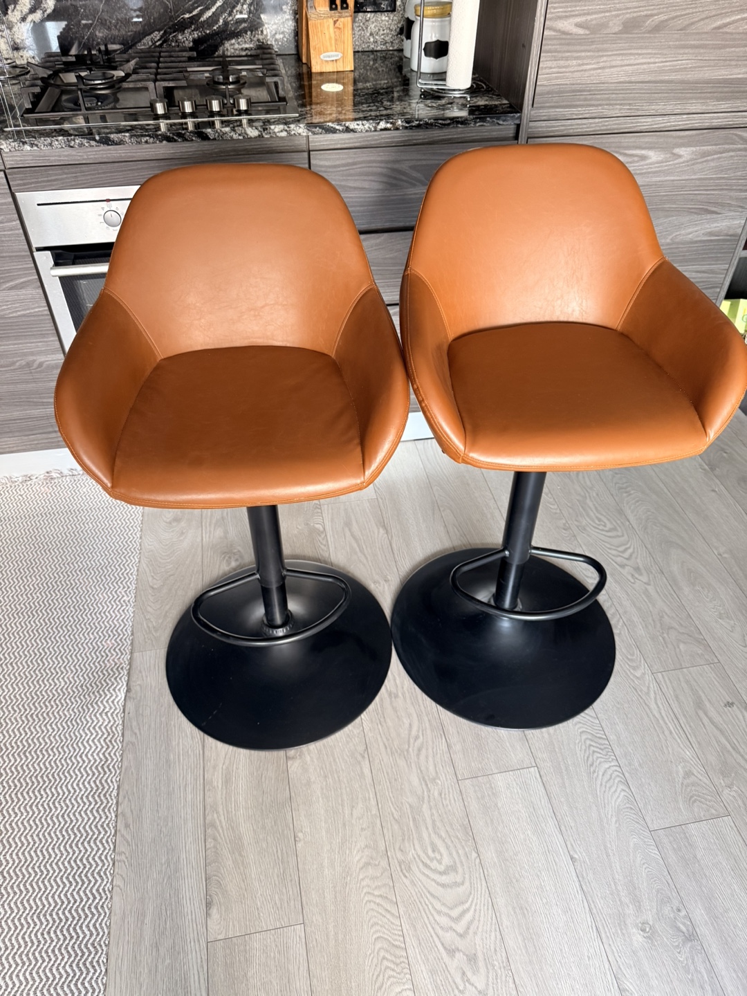 Pair of Brown Leather Bar Stools with Adjustable Height