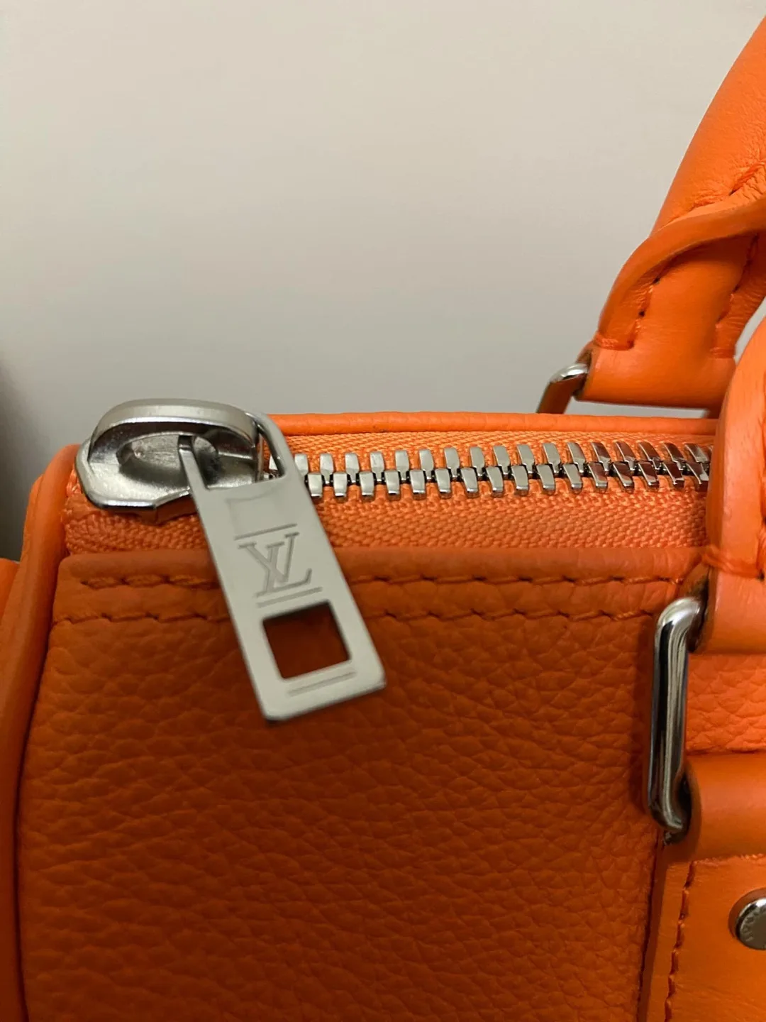 Authentic Louis Vuitton Grained Calfskin Aerogram Keepall XS image indicator(2)