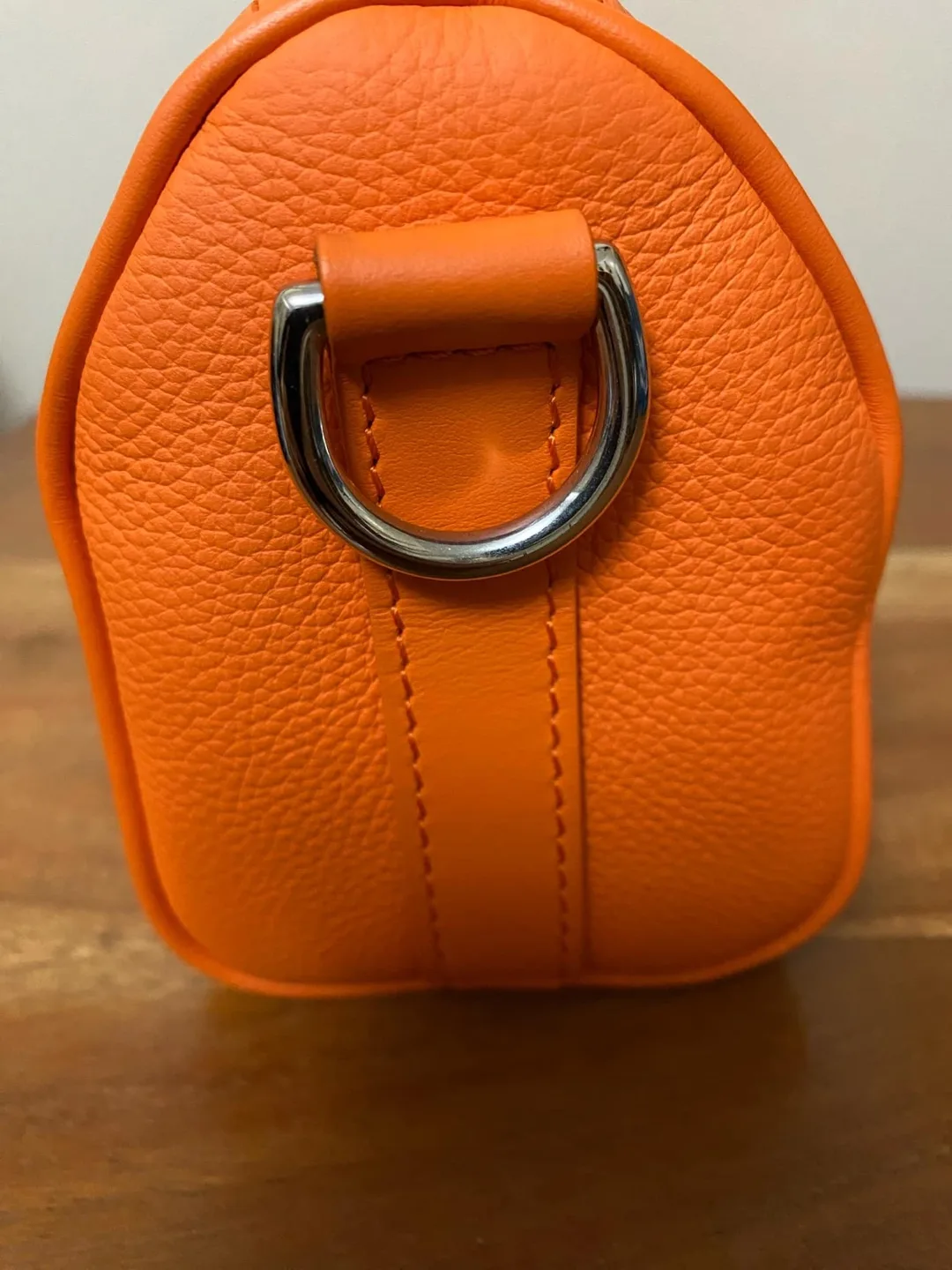 Authentic Louis Vuitton Grained Calfskin Aerogram Keepall XS image indicator(3)