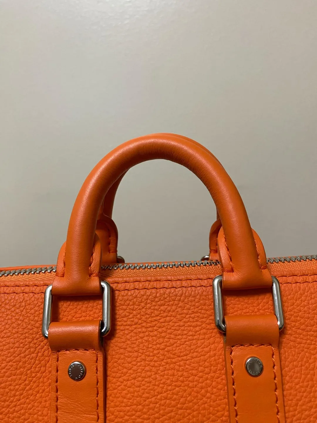 Authentic Louis Vuitton Grained Calfskin Aerogram Keepall XS image indicator(4)