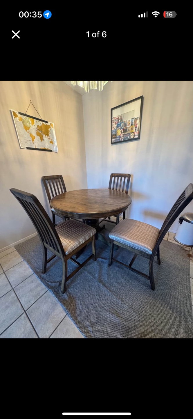 Round dining table and four chairs