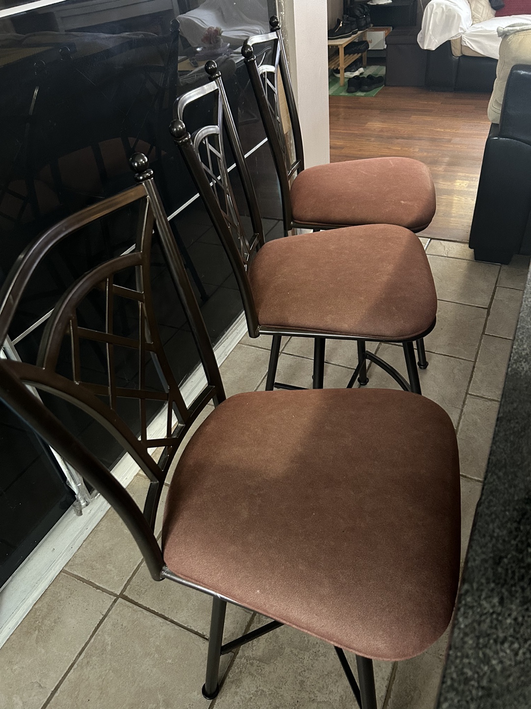 Set of three brown bar stools