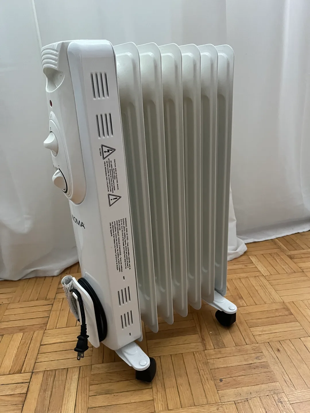 NOMA Oil-Filled Radiator Heater image indicator(2)