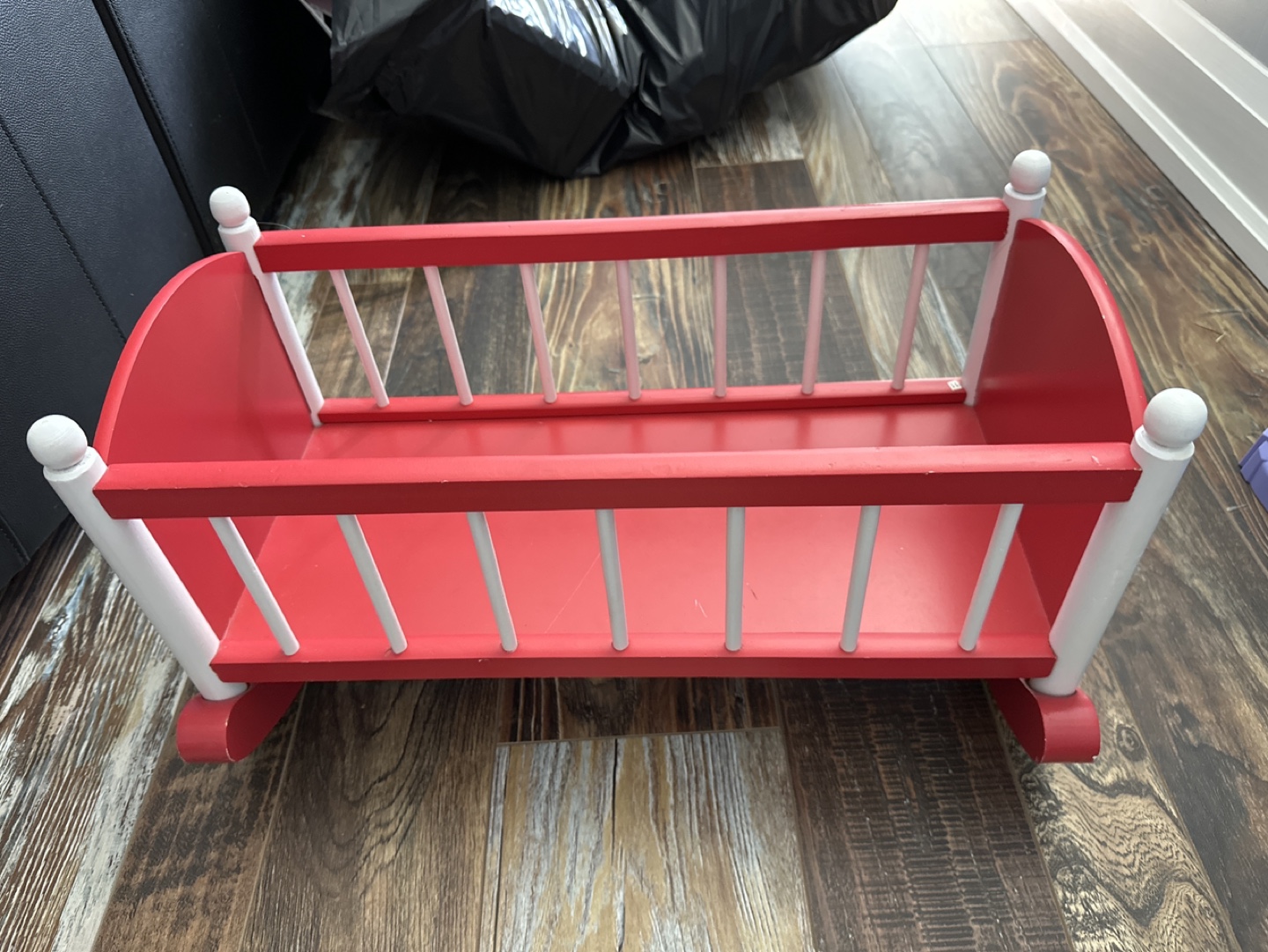 Red and White Wooden Doll Crib