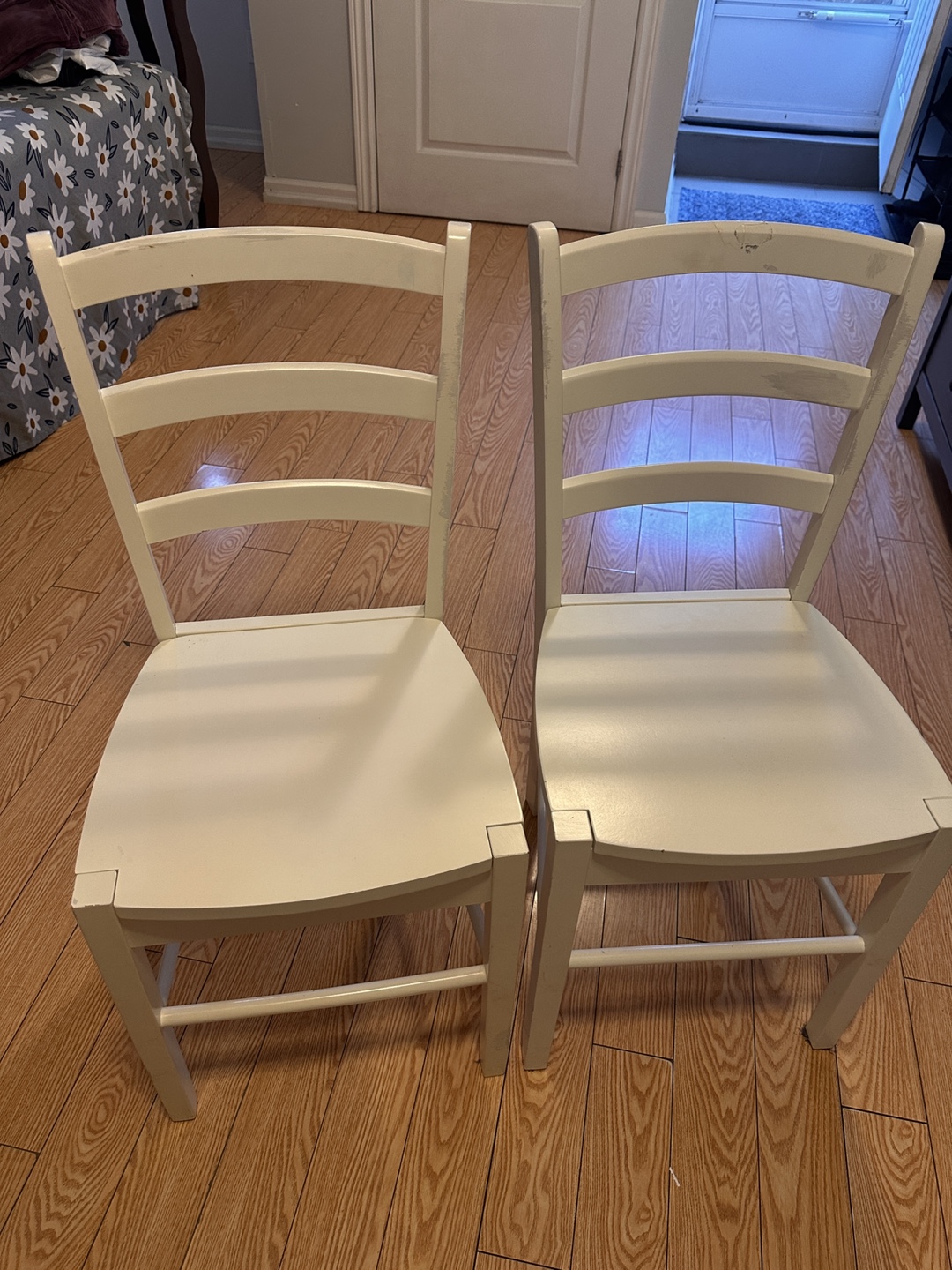 Pair of off-white Ikea wooden chairs
