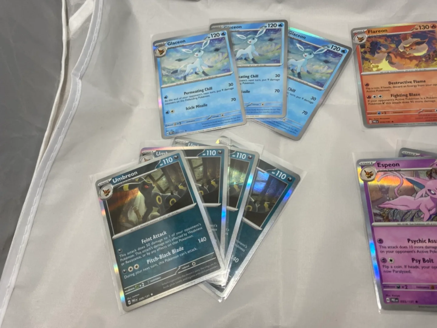 Prismatic Evolutions Lot Of 15 Holographic “Eeveelutions” image indicator(3)