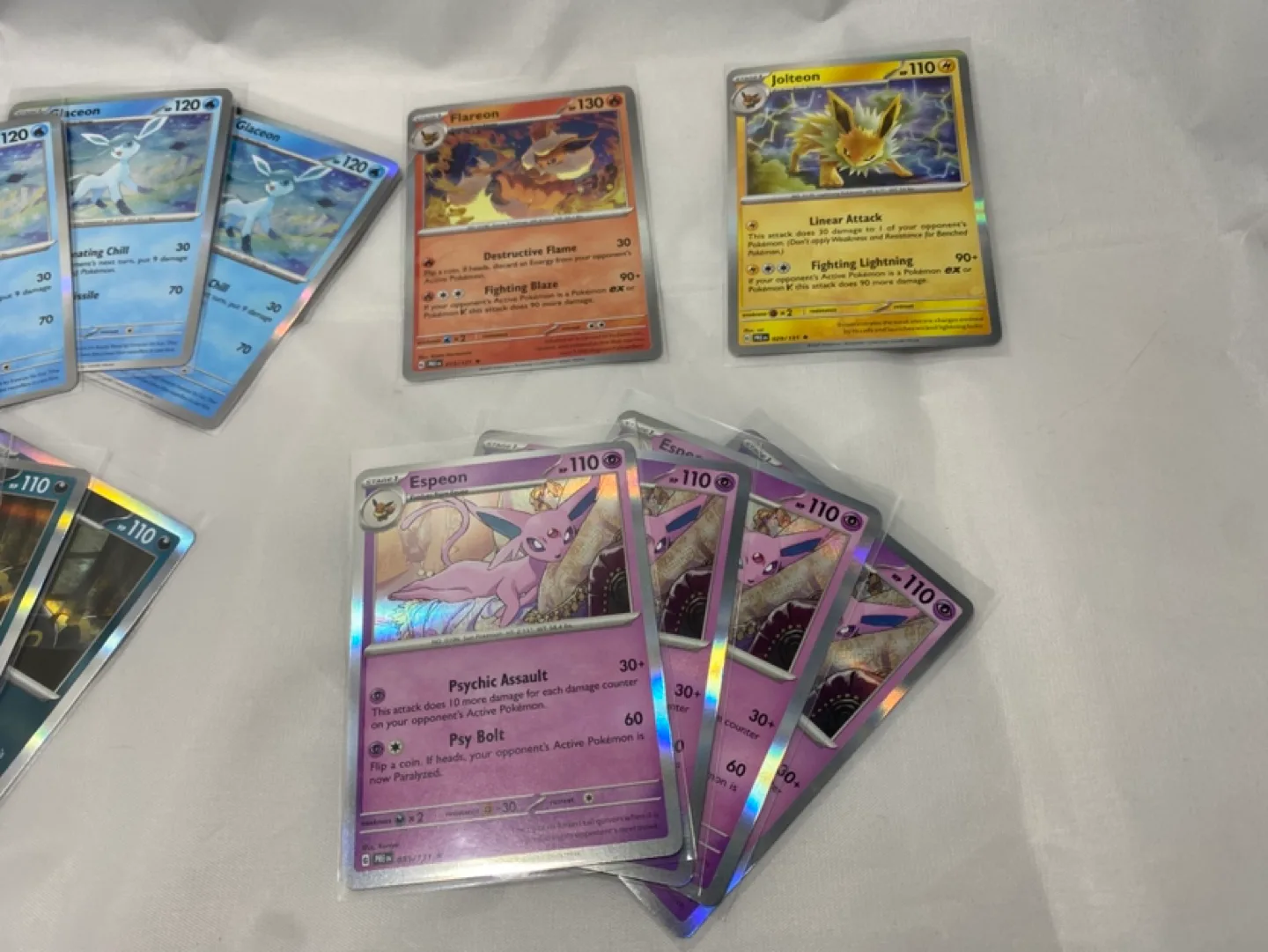 Prismatic Evolutions Lot Of 15 Holographic “Eeveelutions” image indicator(4)