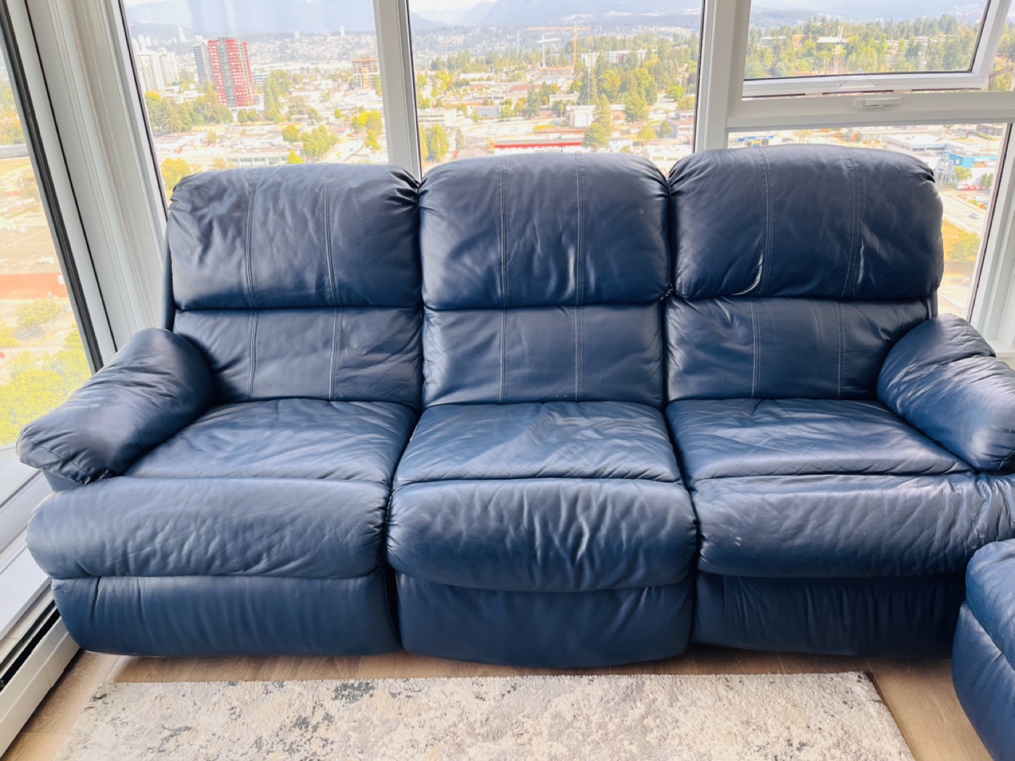 Reclining Leather Sofa and Loveseat Set
