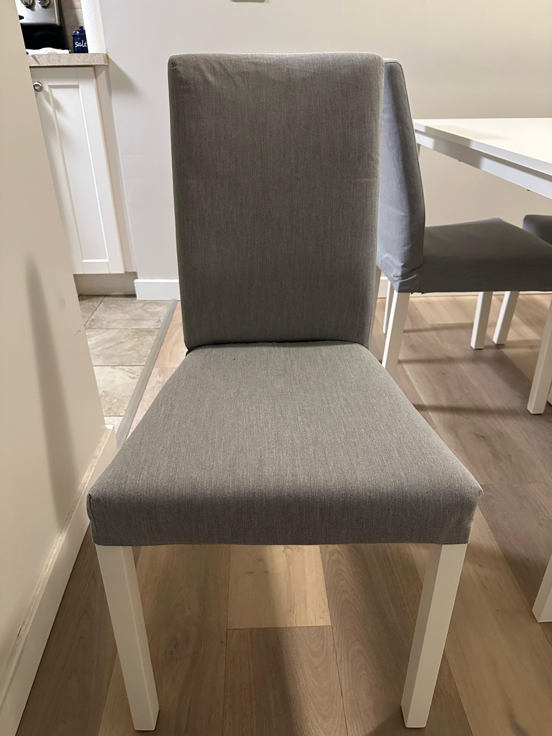 IKEA White Dining Table with Four Grey Chairs - photo 3