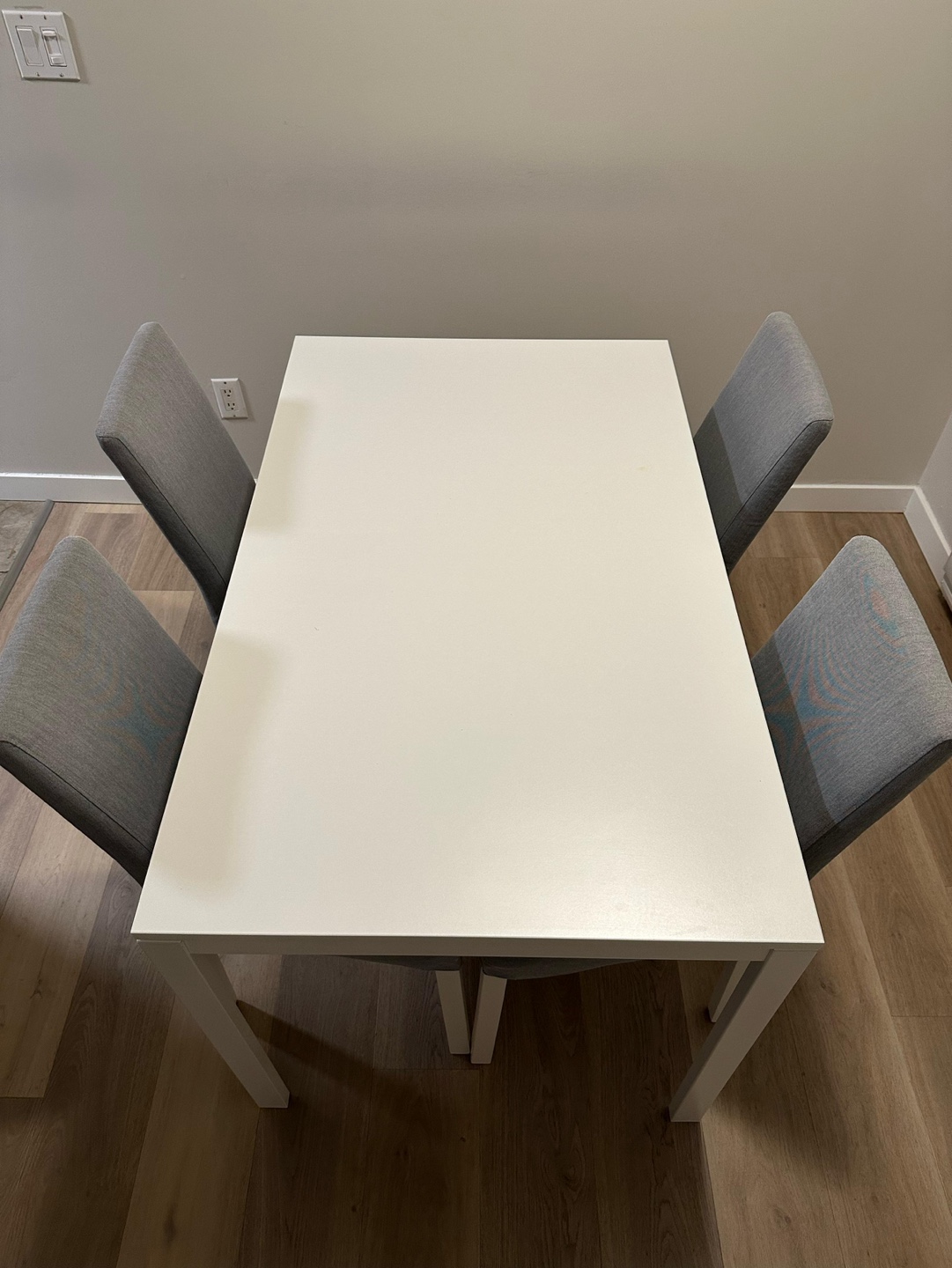 IKEA White Dining Table with Four Grey Chairs - photo 2