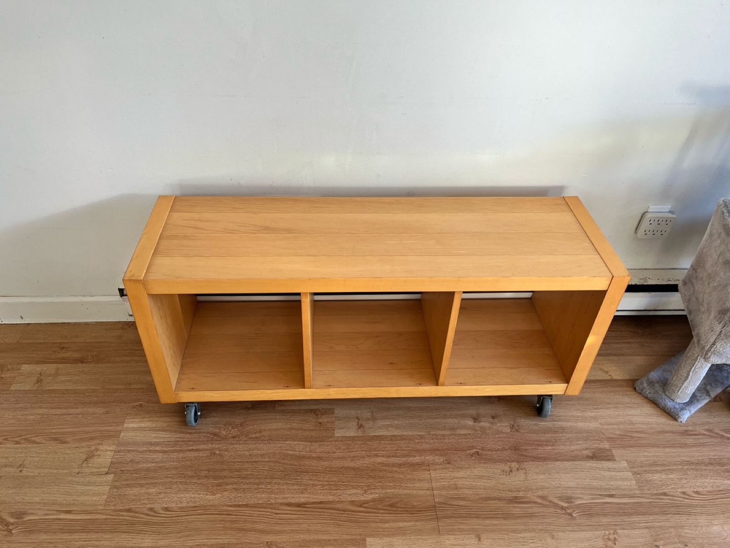 Wooden Storage Unit with Three Compartments and Casters