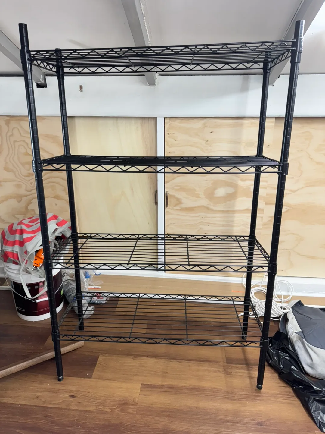 Black Metal 4-Tier Shelving Unit thumbnail
