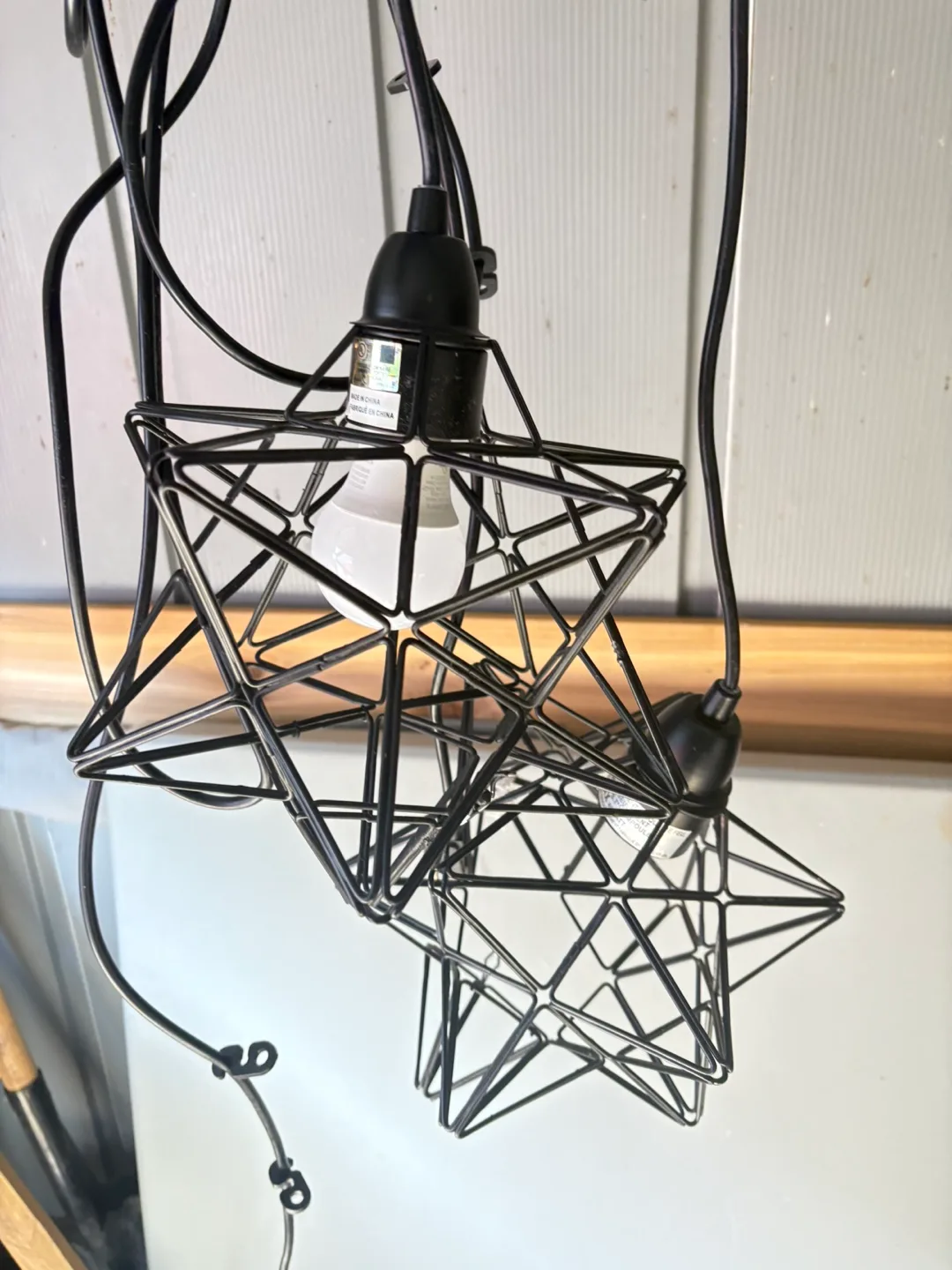 Two Black Star Shaped Pendant Lights image indicator(2)