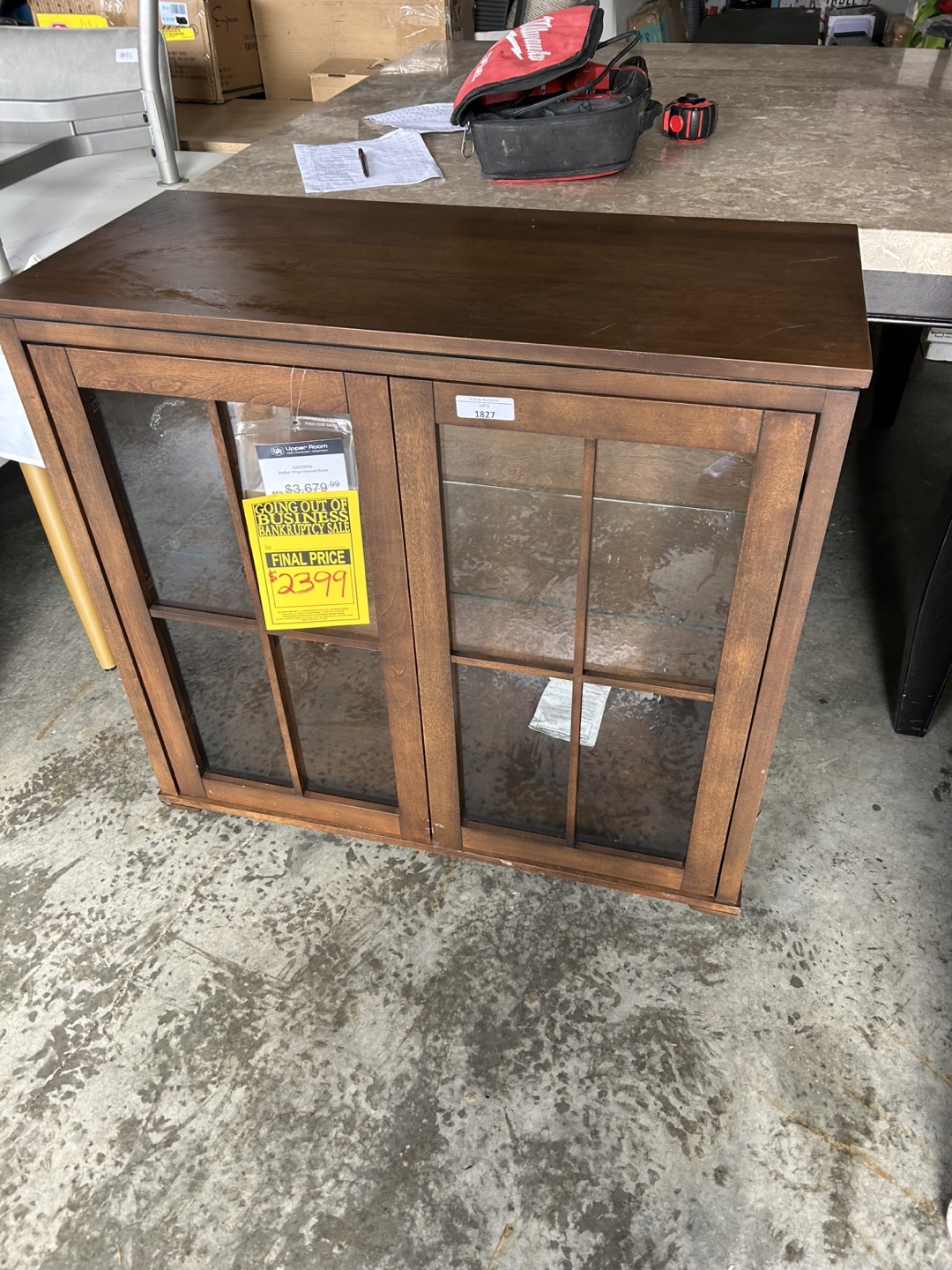 Wooden display cabinet with glass doors